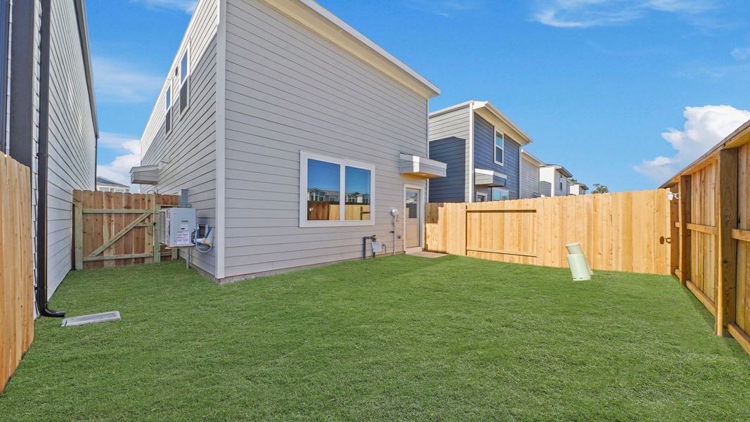 Exterior details and patio area of a home in Bridges on Lake Houston Villas, Humble (Image 2). Exterior details and patio area of a home in Bridges on Lake Houston Villas, Humble (Image 2).