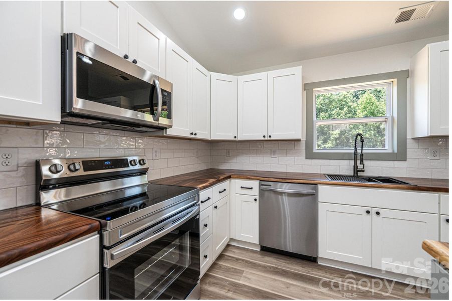 Kitchen with wood countertops Kitchen with wood countertops