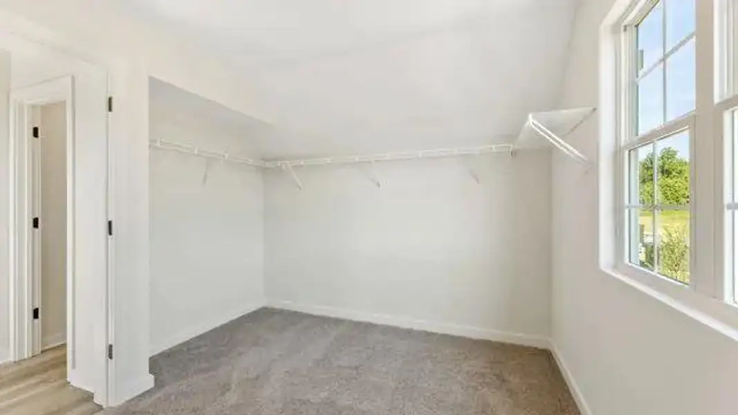 Spacious, unfurnished interior of a new home in The Estates at Gainesville Township, Gainesville (Image 25).