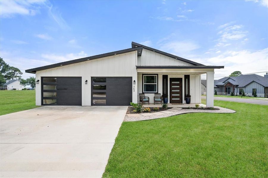Front exterior of a new home in , Trinidad, TX, highlighting curb appeal (Image 20).