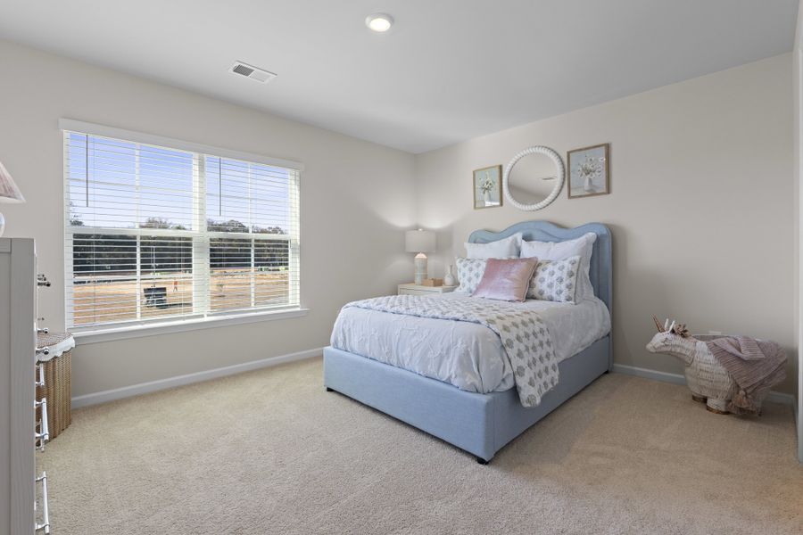 Representative furnished interior of a home built from the Alder C by McGuinn Homes in Forts Ridge, Pelion (Image 62).