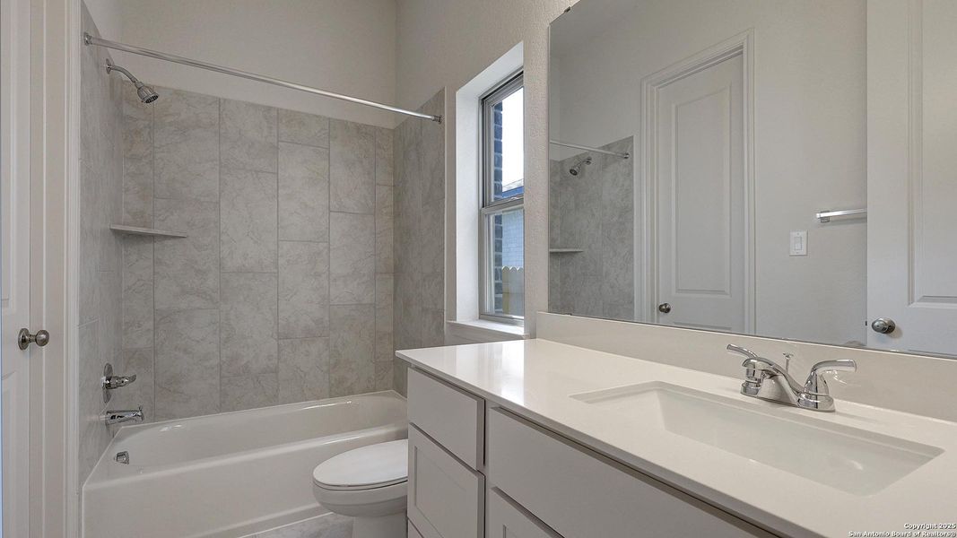 Furnished interior view inside a new home in Kallison Ranch 50', San Antonio (Image 11).