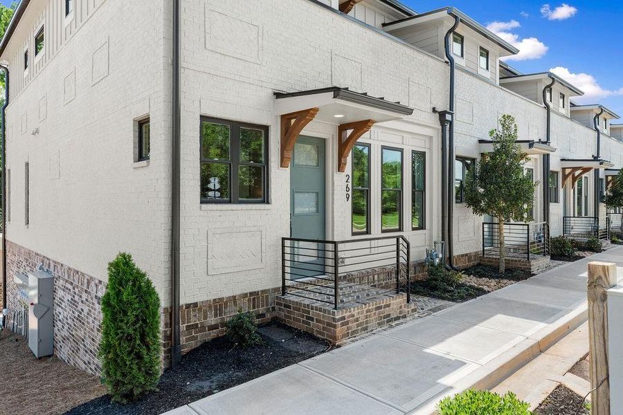 Exterior details and patio area of a home in The Carlyle, Marietta (Image 3).