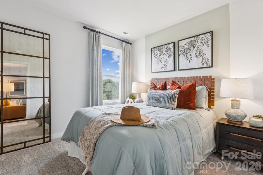 Furnished interior view inside a new home in Meadow Creek Village, Locust (Image 4).