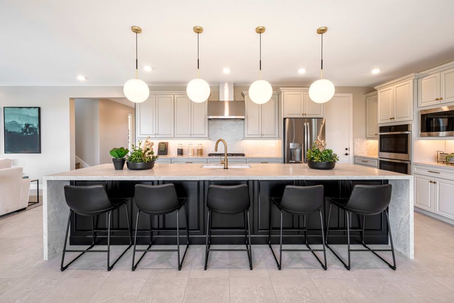 Representative furnished interior of a home built from the Laurel Plan 4002 by Tri Pointe Homes in Waterston Central, Gilbert (Image 5).