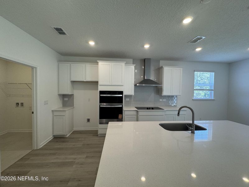Furnished interior view inside a new home in Hyland Trail, Green Cove Springs (Image 11).