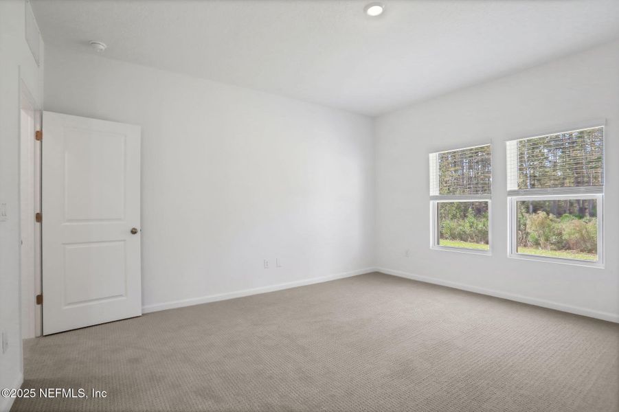 Spacious, unfurnished interior of a new home in Cordova Palms, St. Augustine (Image 24).