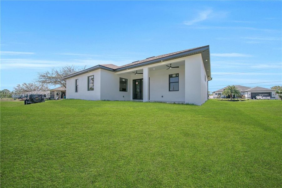 Exterior details and patio area of a home in , Lehigh Acres (Image 2). Exterior details and patio area of a home in , Lehigh Acres (Image 2).