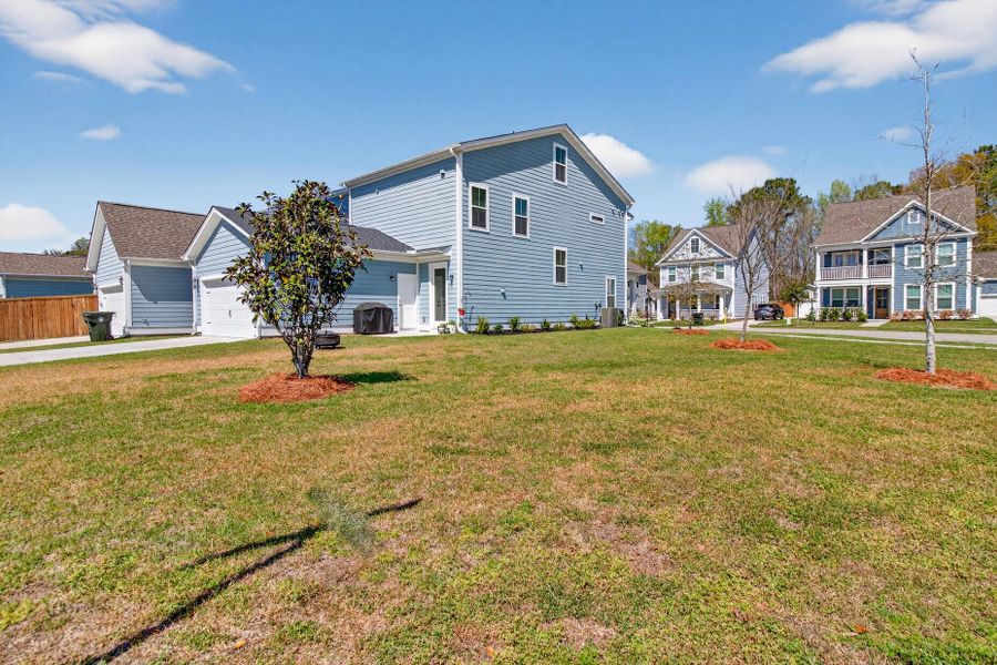 Exterior details and patio area of a home in Twin Lakes, Johns Island (Image 32).