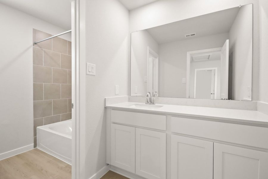 Furnished interior view inside a new home in Northpark South, Porter (Image 11). Furnished interior view inside a new home in Northpark South, Porter (Image 11).