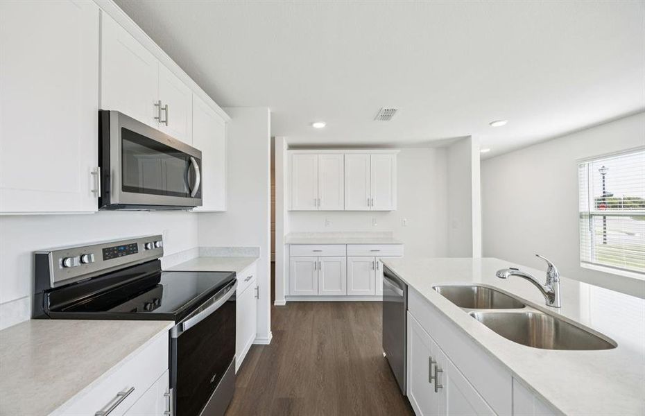 Airy kitchen with ample cabinet space Airy kitchen with ample cabinet space