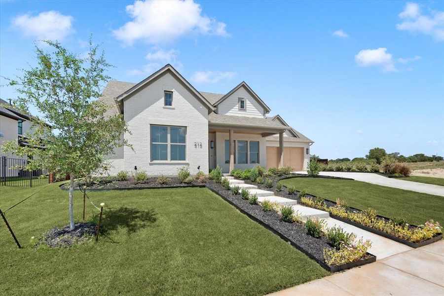 View of front of home with a front lawn