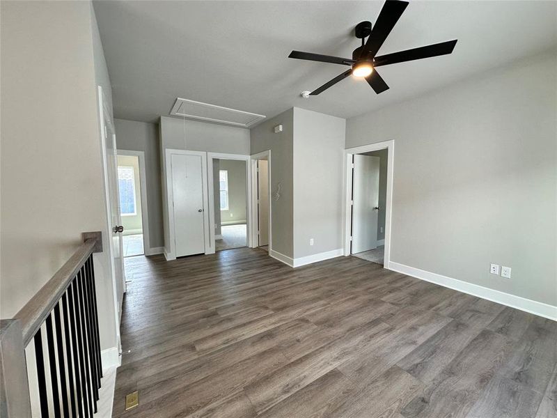 Upstairs Living Room featuring ceiling fan and dark wood-type flooring