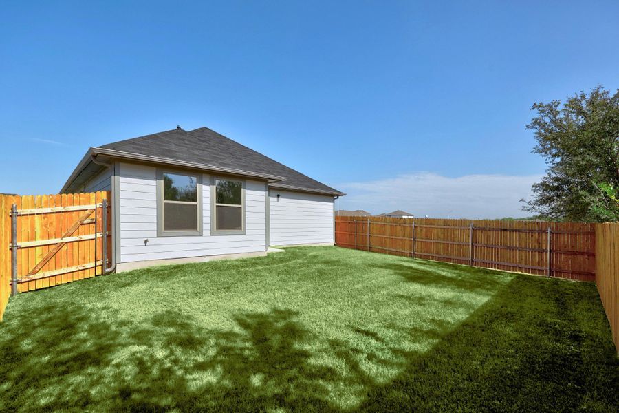 Exterior details and patio area of a home in Trinity Ranch, Elgin (Image 22).