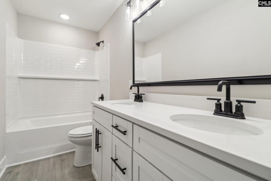Furnished interior view inside a new home in Collins Cove, Chapin (Image 7). Furnished interior view inside a new home in Collins Cove, Chapin (Image 7).