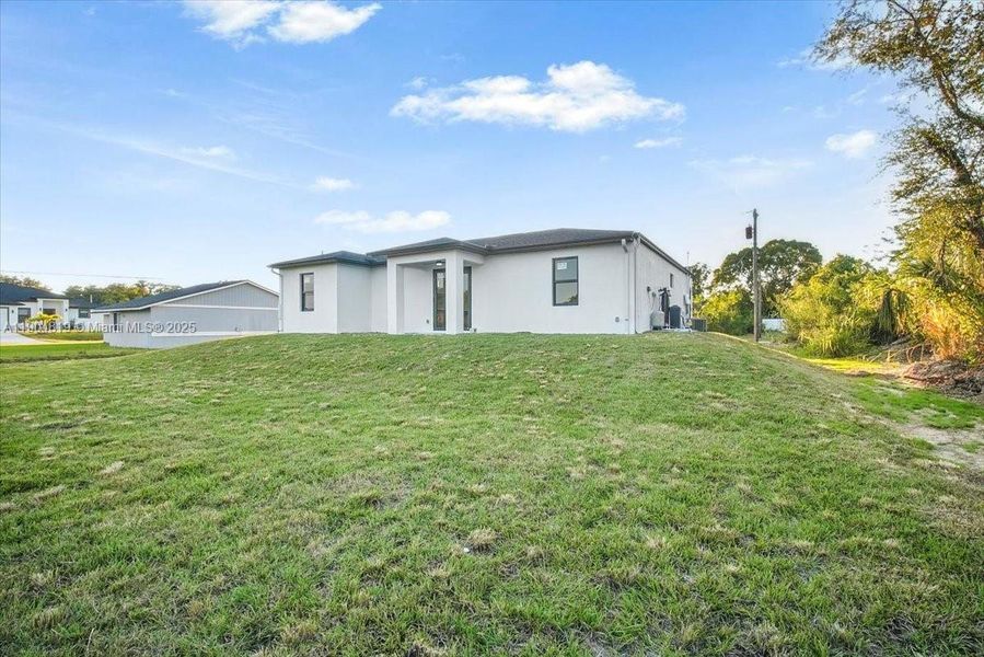 Exterior details and patio area of a home in , Lehigh Acres (Image 24).