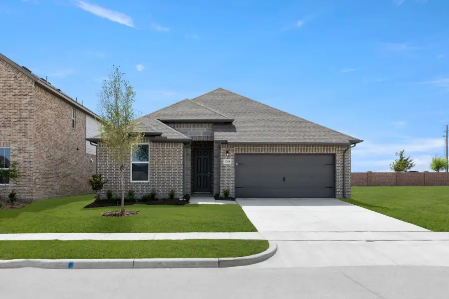 Representative exterior photo of a completed home built from the Patriot by Rockwell Homes in Walden Pond, Forney, TX (Image 33). Representative exterior photo of a completed home built from the Patriot by Rockwell Homes in Walden Pond, Forney, TX (Image 33).