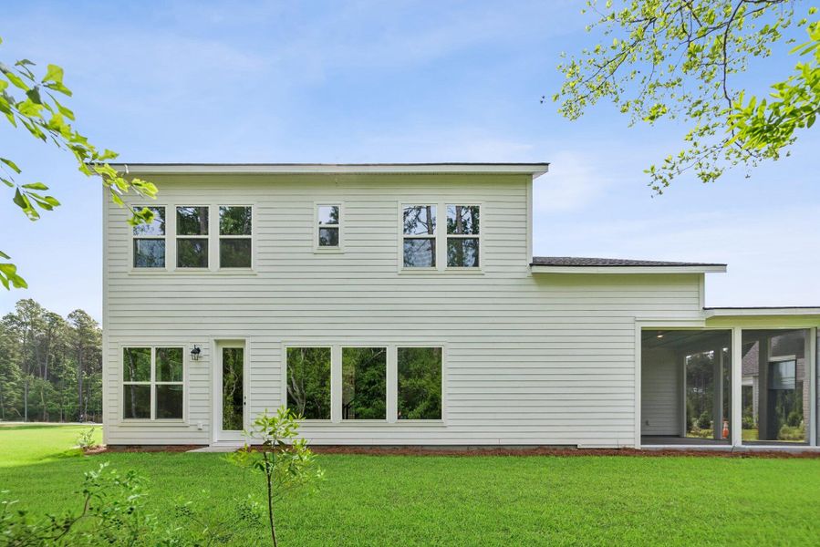 Exterior details and patio area of a home in Hidden Ponds Reserve, Awendaw (Image 15).