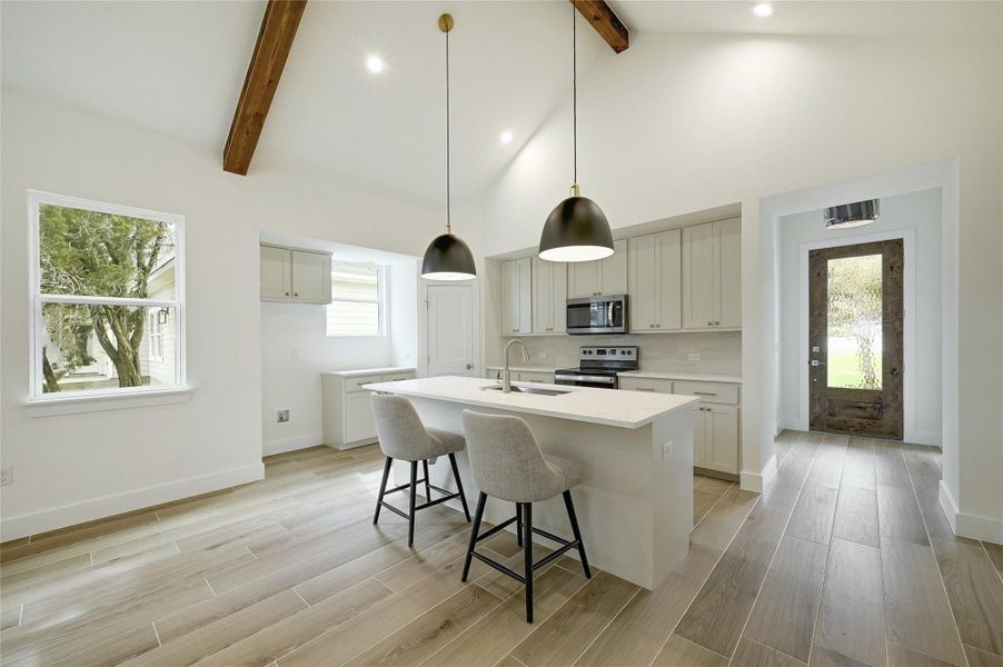 High vaulted ceilings with cedar beams