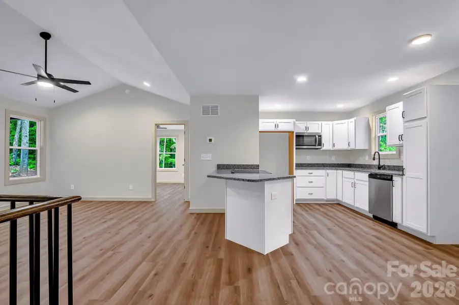 Furnished interior view inside a new home in , Waynesville (Image 3).