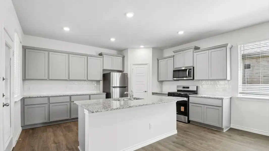 Furnished interior view inside a new home in The Woods at Lindsey Place, Anna (Image 3).