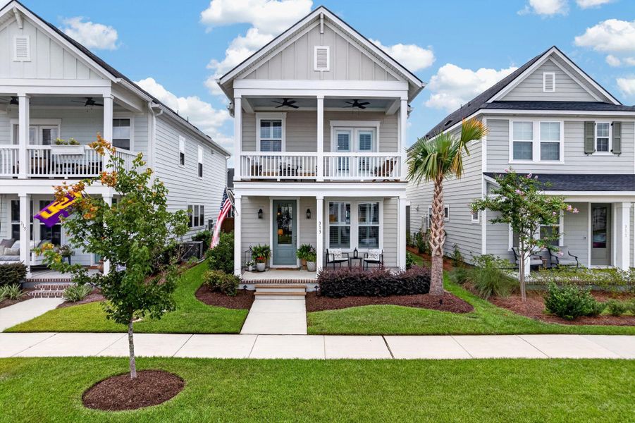 Front exterior of a new home in Nexton - Midtown - The Park Collection, Summerville, SC, highlighting curb appeal (Image 23). Front exterior of a new home in Nexton - Midtown - The Park Collection, Summerville, SC, highlighting curb appeal (Image 23).