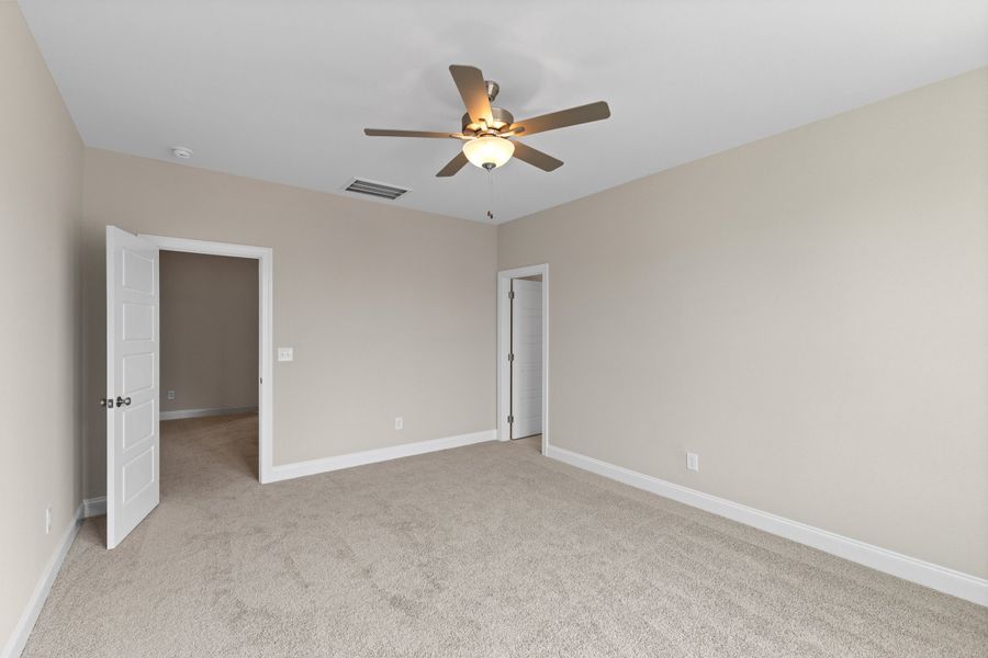 Representative unfurnished interior of a home built from the The Juniper by RobuckHomes in Kennebec Crossing, Angier (Image 98).