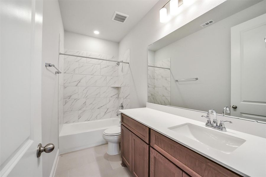 Furnished interior view inside a new home in Sienna 40', Missouri City (Image 7). Furnished interior view inside a new home in Sienna 40', Missouri City (Image 7).