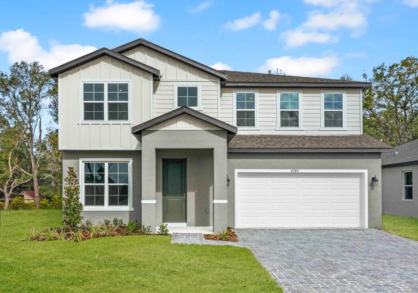 Representative exterior photo of a completed home built from the Florence by Hartizen Homes in Estes Reserve, Eustis, FL (Image 24).