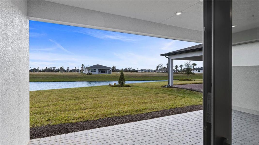 Exterior details and patio area of a home in Woodland Preserve, Parrish (Image 4).