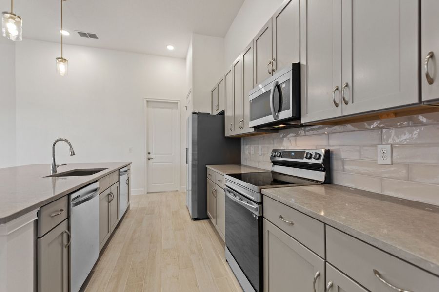 Representative furnished interior of a home built from the Oceanside by Park Square Residential in Paradiso Grande, Orlando (Image 6).