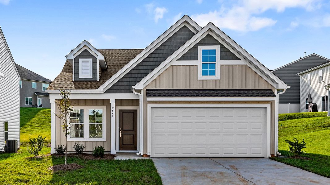 Front exterior of a new home in Hanes Lake, Winston-Salem, NC, highlighting curb appeal (Image 1). Front exterior of a new home in Hanes Lake, Winston-Salem, NC, highlighting curb appeal (Image 1).