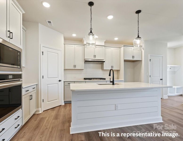 Furnished interior view inside a new home in North Creek Village, Huntersville (Image 5).
