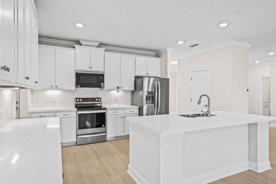 Furnished interior view inside a new home in Windswept Estates, Freeport (Image 8).