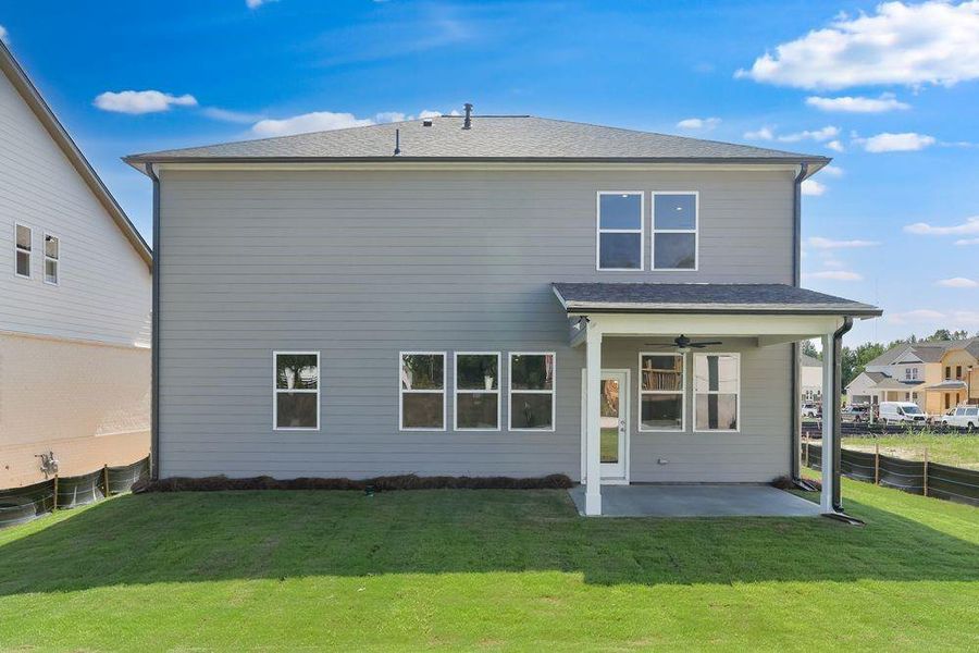Front exterior of a new home in Oakmead, Buford, GA, highlighting curb appeal (Image 2). Front exterior of a new home in Oakmead, Buford, GA, highlighting curb appeal (Image 2).