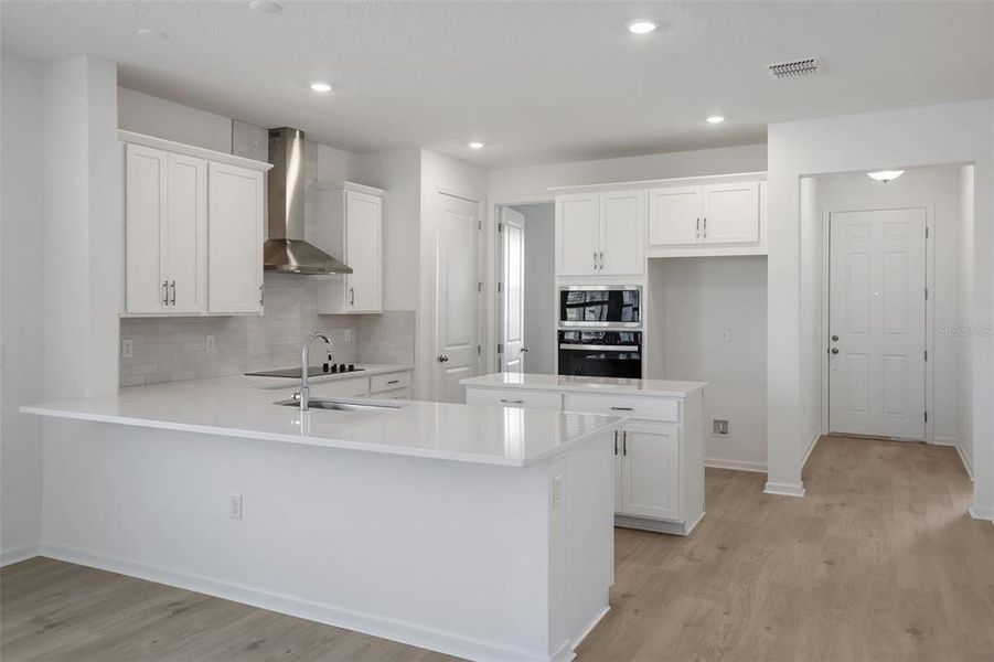 Furnished interior view inside a new home in Crossroads at Kelly Park, Apopka (Image 7).
