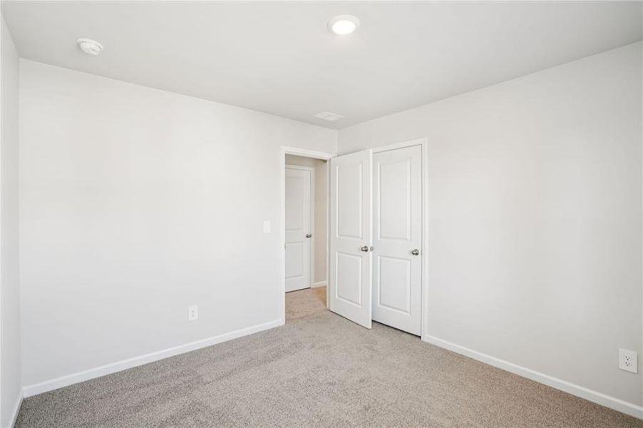 Spacious, unfurnished interior of a new home in Hawthorne Station, College Park (Image 25).