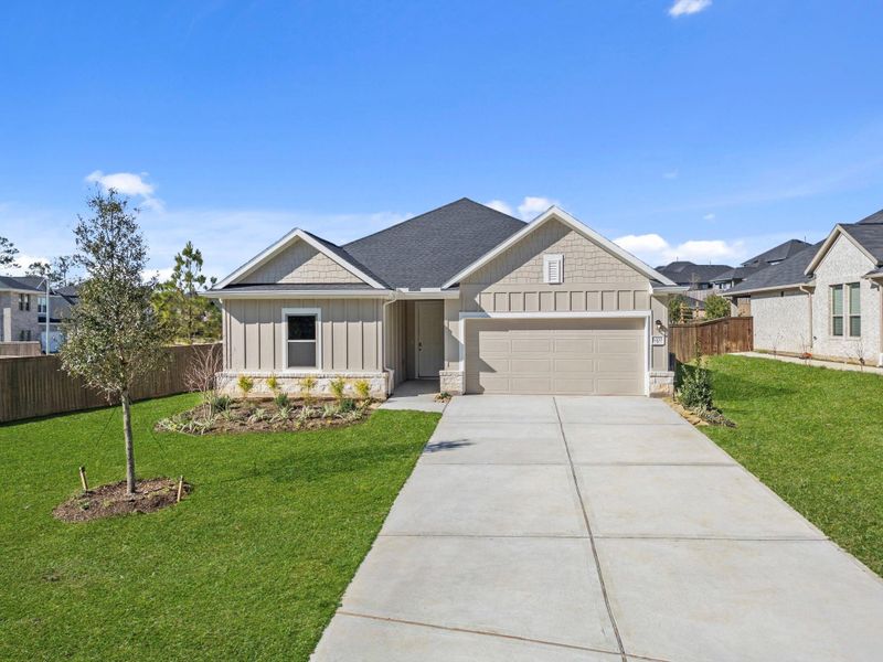 Front exterior of a new home in Westridge Cove, Conroe, TX, highlighting curb appeal (Image 21).