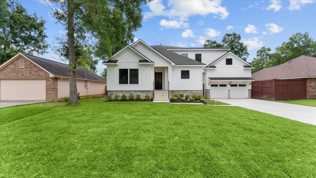 Front exterior of a new home in , Conroe, TX, highlighting curb appeal (Image 17).