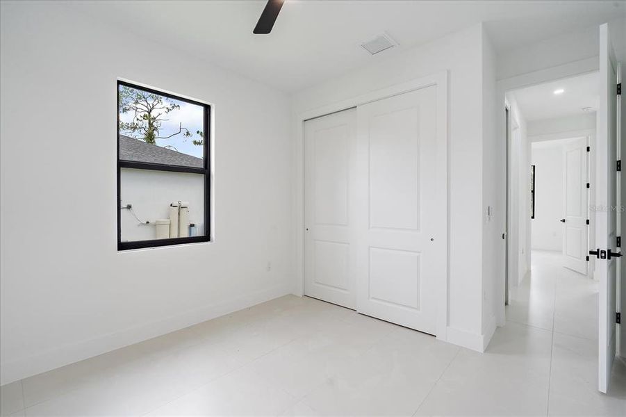 Spacious, unfurnished interior of a new home in , Port Charlotte (Image 12).