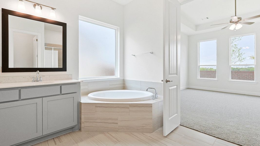 Representative furnished interior of a home built from the Princeton by DRB Homes in Creekhaven, Iowa Colony (Image 14).