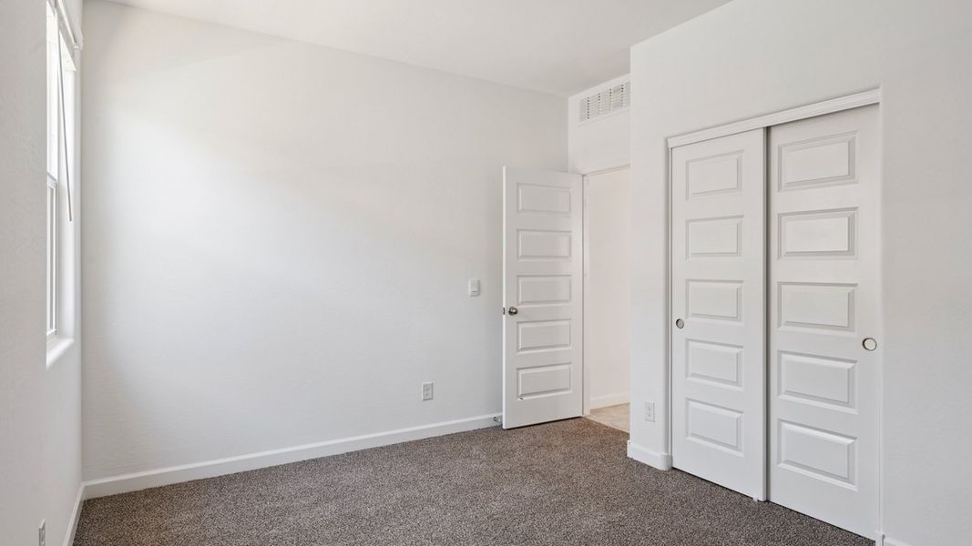 Spacious, unfurnished interior of a new home in Carlton Commons, Casa Grande (Image 24). Spacious, unfurnished interior of a new home in Carlton Commons, Casa Grande (Image 24).