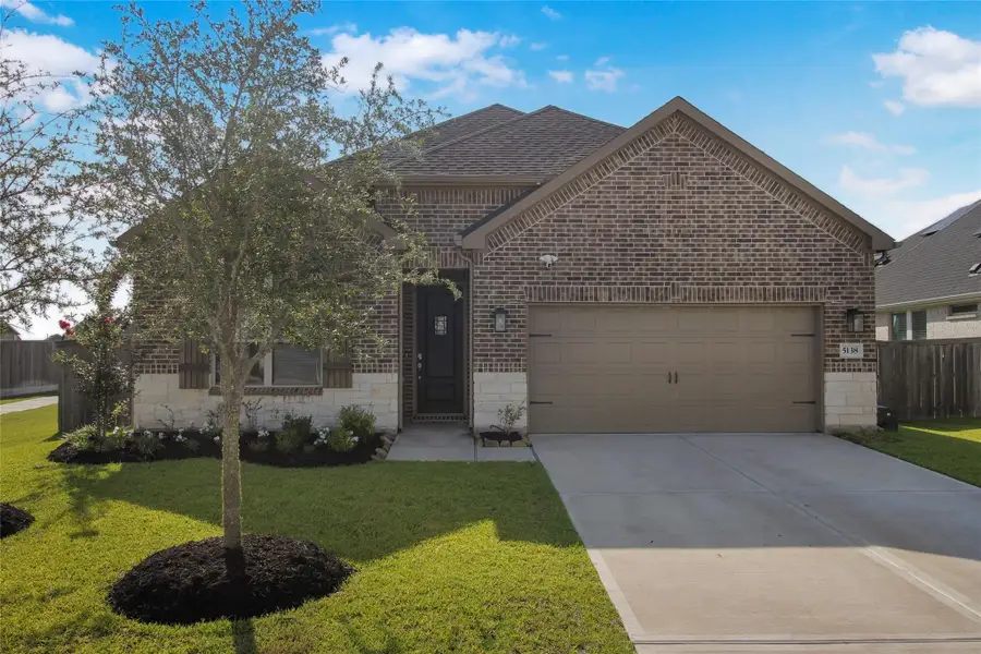 Front exterior of a new home in , Richmond, TX, highlighting curb appeal (Image 1). Front exterior of a new home in , Richmond, TX, highlighting curb appeal (Image 1).