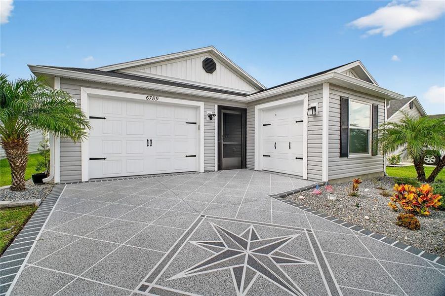Front exterior of a new home in , The Villages, FL, highlighting curb appeal (Image 19). Front exterior of a new home in , The Villages, FL, highlighting curb appeal (Image 19).