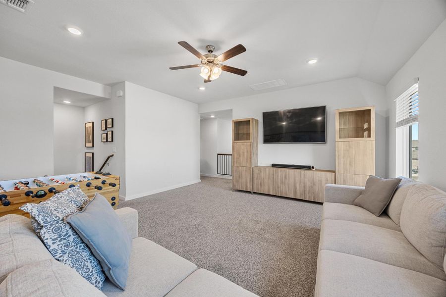 Large Game room with recessed lighting.