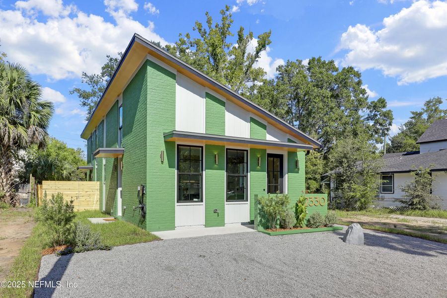 Front exterior of a new home in , Jacksonville, FL, highlighting curb appeal (Image 31).