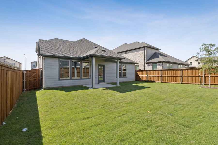 Covered Patio in the Stanley II home plan by Trophy Signature Homes – REPRESENTATIVE PHOTO