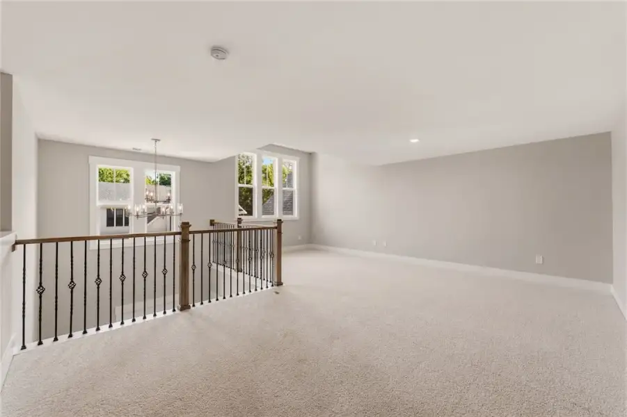 A spacious upper-level loft area offers abundant n A spacious upper-level loft area offers abundant n