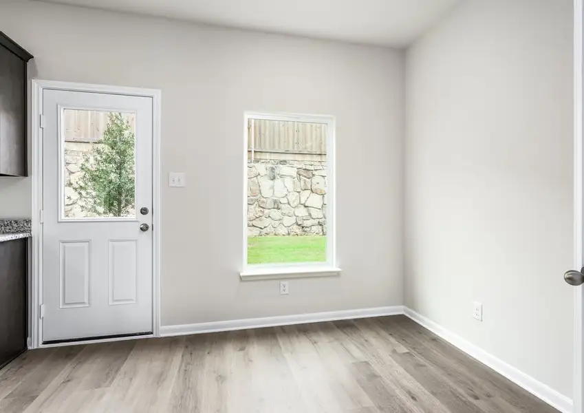 The dining room has windows that let in great, natural light. The dining room has windows that let in great, natural light.