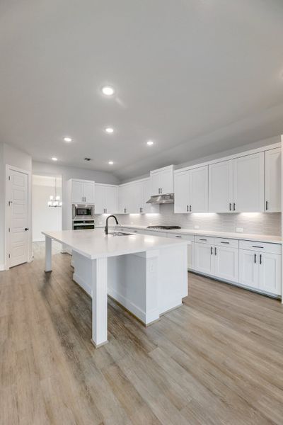 Furnished interior view inside a new home in Double Eagle Ranch, Cedar Creek (Image 7).